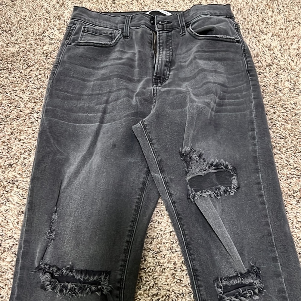 Grey jeans ripped